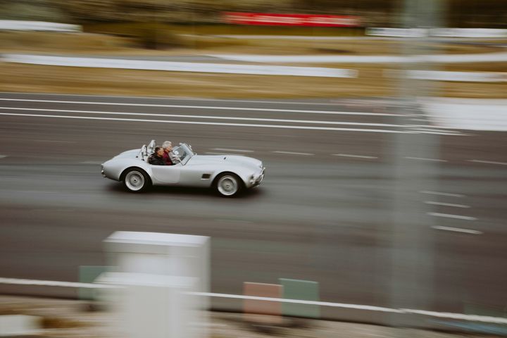 Two guys in speedy car